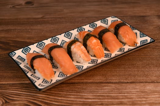 japanese sushi food. Maki ands rolls with tuna, salmon, shrimp, crab and avocado, High quality photo