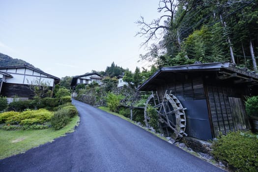 Hiking path and towns on the famous Magome-Tsumago Trail as part of the Nakasendo Way between Magome and Tsumago in Gifu Prefecture, Japan