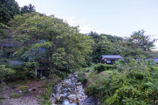 Hiking path and towns on the famous Magome-Tsumago Trail as part of the Nakasendo Way between Magome and Tsumago in Gifu Prefecture, Japan