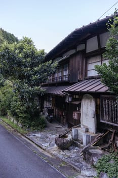 Hiking path and towns on the famous Magome-Tsumago Trail as part of the Nakasendo Way between Magome and Tsumago in Gifu Prefecture, Japan