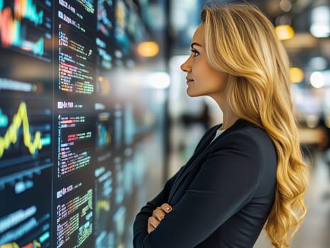 Profile of a businesswoman with long blonde hair, observing financial data and stock charts on a digital screen, representing finance, analysis, and decision-making.