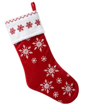 Red Christmas sock for gifts hanging on white background. Isolated red and white Christmas sock