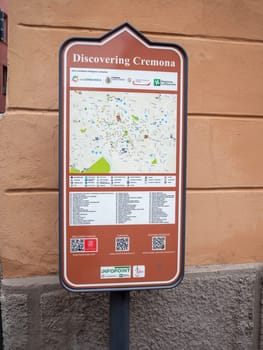Cremona, Lombardy, Italy October 15th 2024 Vertical signage provides a map and qr codes for tourists discovering cremona, lombardy, italy