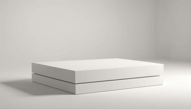 A white, rectangular pedestal sits on a white surface. The pedestal is made of two stacked squares.