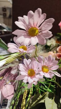 pink flowers petals, yellow stamens, artificial plants. High quality photo