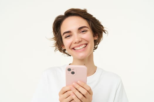 Image of happy smiling woman with smartphone, isolated on white background.