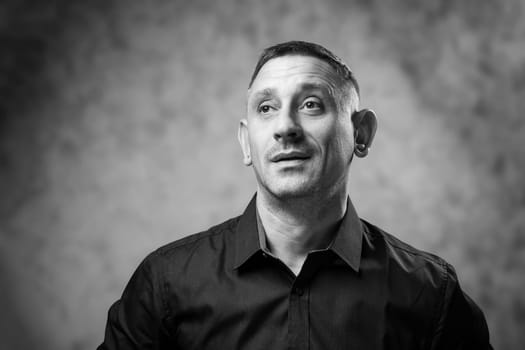 black and white portrait of a man in a shirt