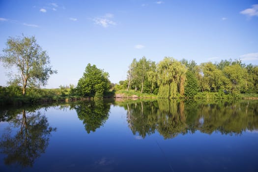 The Summer fishing on a beautiful lake