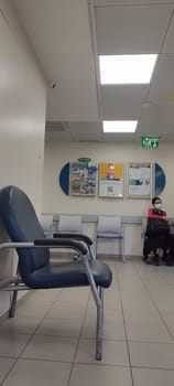 November 12 2024 Beer-Sheva Israel Clalit clinic , medical centre,black chair, hall lounge for patients, editorial photo . High quality photo