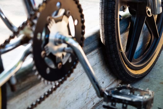Close up of bmx bike on a ramp in a skatepark, BMX concept.