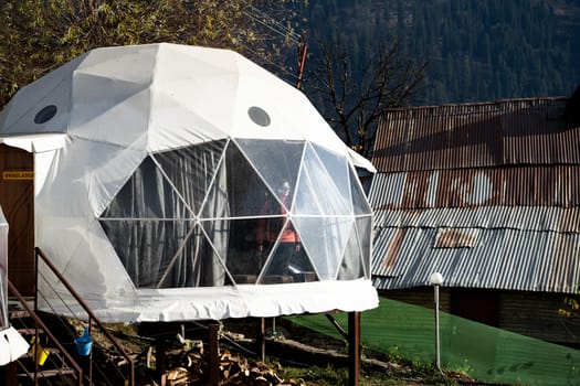 geodesic, triangular and swiss tents at a popular glamping spot near hampta village manali for eco freindly and comfortable adventure stays in India