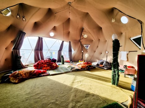 Interior of geodesic, triangular and swiss tents at a popular glamping spot near hampta village manali for eco freindly and comfortable adventure stays in India