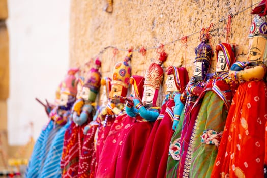 Colorful rajasthani puppets hand made and painted used as decorations or theater props in plays very popular in Jodhpur, Jaisalmer and across Rajasthan