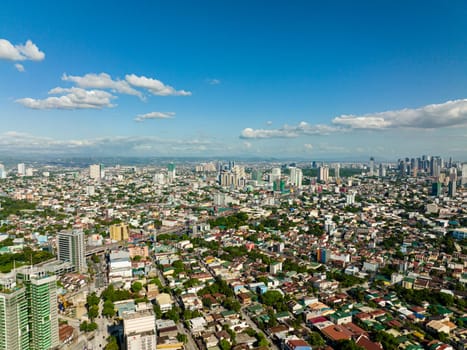 Aerial drone of Manila is the capital of the Philippines with modern buildings and skyscrapers.