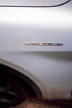 Cremona, Lombardy, Italy - November 7th 2024 Veloce badge on a silver alfa romeo car, representing speed and italian automotive design