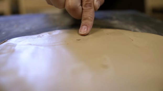 Artisan Hands at Work Passionately Crafting Beautiful Creations with Clay and Careful Precision. Stock Clip