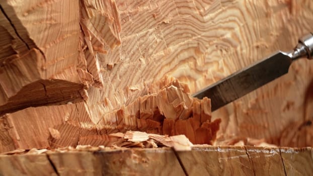 An exquisite artistic display of woodworking, showcasing intricate and precise chisel techniques on fresh wood. Stock Clip