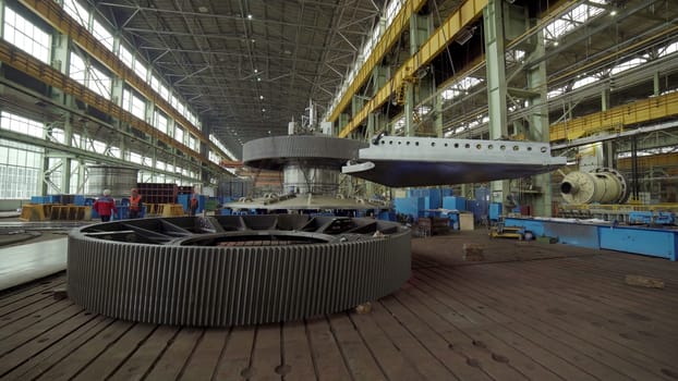 An impressive workshop event is showcasing the highly skilled assembly process of various aircraft components. Stock Clip
