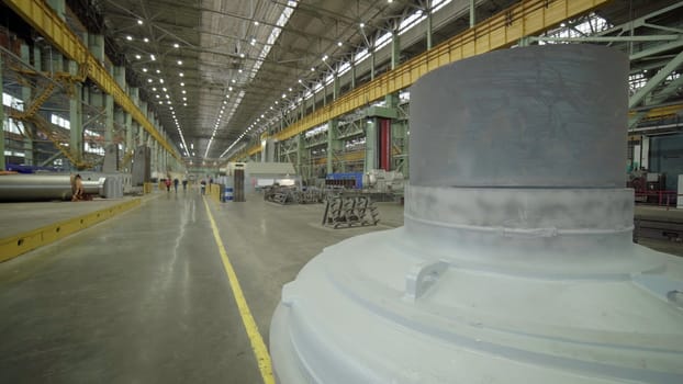 A wide view of an expansive industrial manufacturing facility filled with various machinery and equipment. Stock Clip