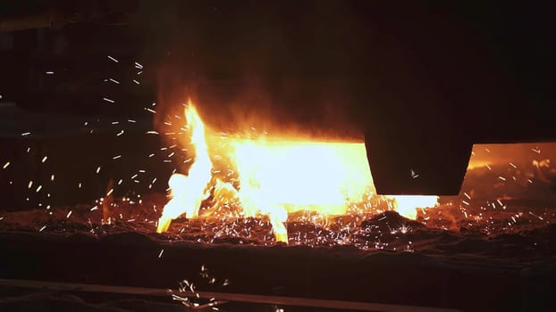 A vivid depiction of molten metal in a bustling steel mill, showcasing industrial craftsmanship and raw energy. Stock Clip