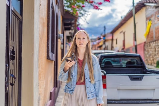 Female tourist walks through the colonial streets San Cristobal de las Casas, Mexico. Cultural exploration, architecture, and travel experience concept.