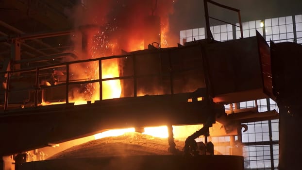 A captivating display of molten metal poured skillfully in a foundry, showcasing intricate industrial techniques. Stock Clip