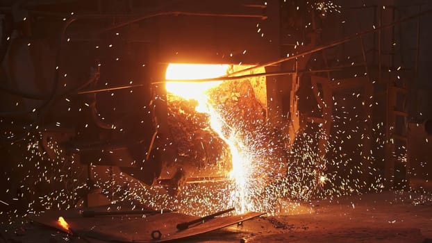 A captivating display of molten metal and sparks during a meticulous welding process in an industrial setting. Stock Clip