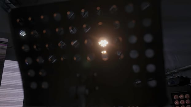 A captivating grid pattern is beautifully enhanced by a bright central light source casting a radiant glow. Clip