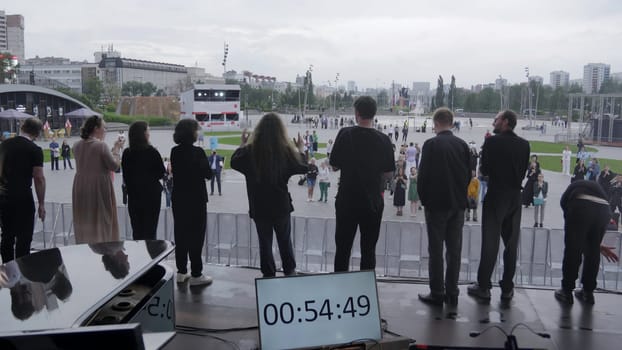 Georgia, Tbilisi - July 20, 2024: Participants are energetically preparing for an incredibly exciting event as the countdown clock approaches zero. Clip