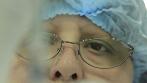 This video highlights vaccinations critical role in public health, showcasing a surgeon, vaccine preparation, and the inoculation moment