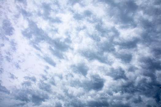A captivating display of beautifully textured clouds that fill the vast sky, reflecting the natural beauty around us
