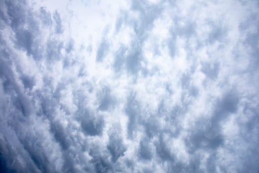 A captivating view of dynamic cloud formations in a brilliant blue sky, ideal for creating emotional visuals