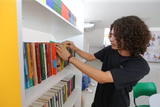 pilao arcado, bahia, brazil - november 13, 2024: students from a public school in the state of Bahia are seen in a library.