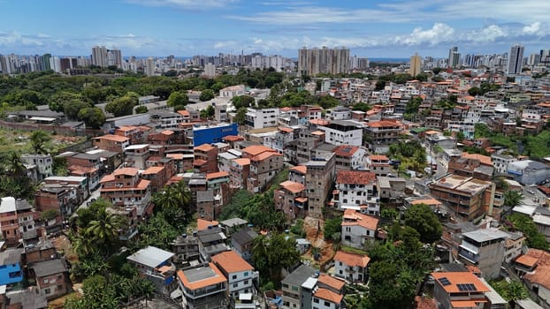 salvador, bahia, brazil - october 16, 2024: Aerial view of housing in a favela community in the city of Salvador.