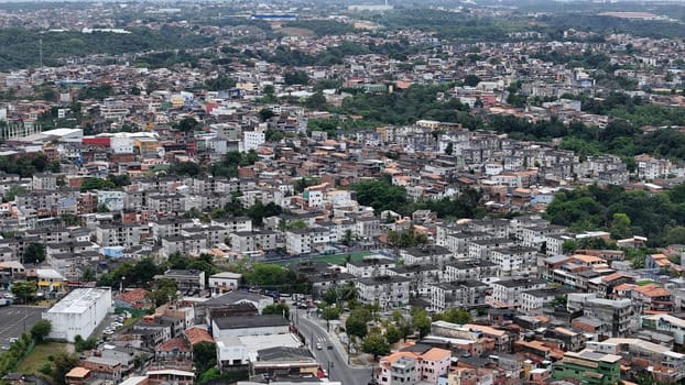 salvador, bahia, brazil - october 16, 2024: Aerial view of housing in a favela community in the city of Salvador.