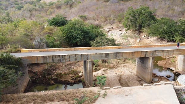 anage, bahia, brazil - june 26, 2024: view of a dry river in the rural area of ​​the city of Anage.