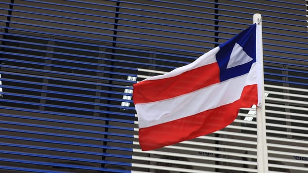 salvador, bahia, brazil - september 18, 2023: Bahia state flag seen on a flagpole in the city of Salvador.
