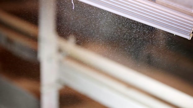 A close up of delicate vapor rises, highlighting light and texture in a contemporary, elegant setting. Stock Clip