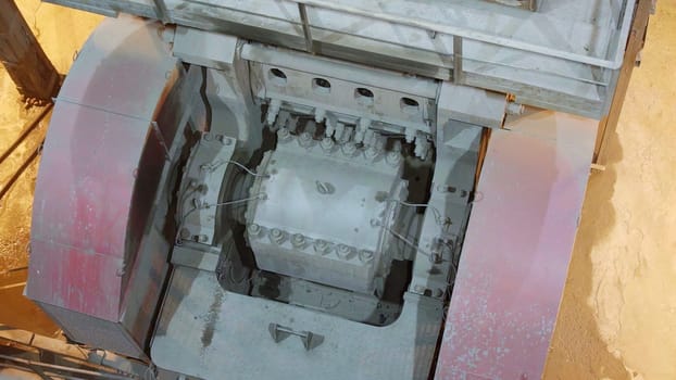 An aerial view captures heavy machinery at work, highlighting their complex designs and operational efficiency. Stock Clip