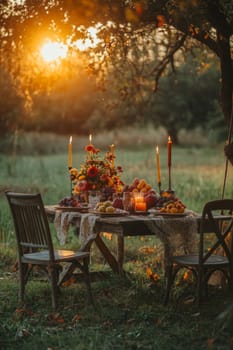 A very beautifully set table in nature, in a cozy autumn garden. High quality photo