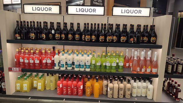 15 October 2024 Tel-Aviv Israel Ben Gurion airport, duty free shop, alcohol drink liquor in bottles. High quality photo
