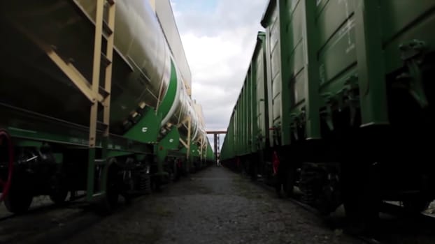 This video showcases captivating train scenes, featuring a variety of colorful train cars, a traveling cargo train, and scenic views