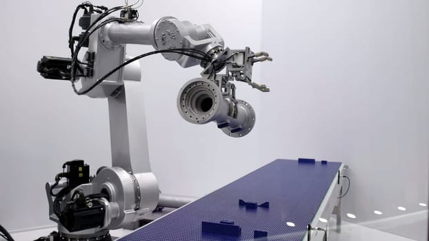 An innovative robotic arm was demonstrated in a sleek manufacturing setup designed for automation processes. Media