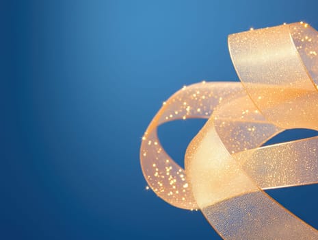 Elegant gold ribbons shimmer against blue background, creating festive atmosphere.