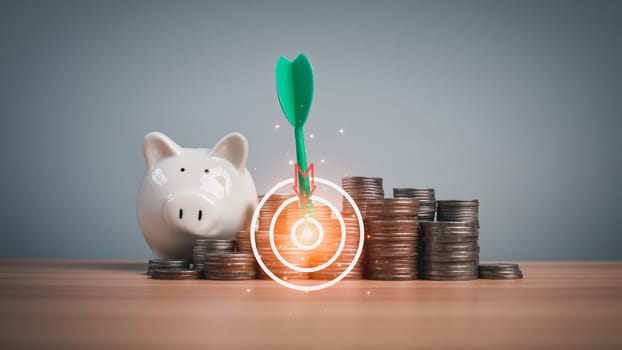 Piggy bank and coins lined up on a wooden background with target icons on a white background. Financial concepts, savings and investments