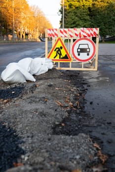 Municipal sign indicating roadworks Municipal sign indicating upcoming road works. Road works, repair sign