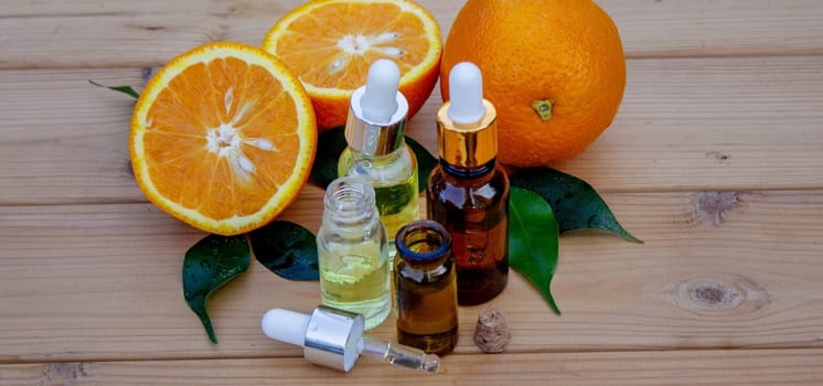 Essential extract of orange oil. Selective focus.