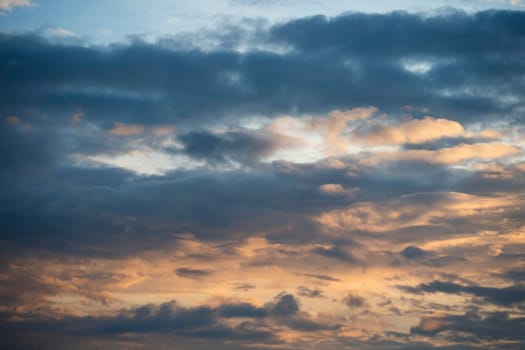 Sunrise background, Dramatic majestic scenery sunset, Sky with clouds in Sunrise sky light background. Sunrise with clouds in various shapes, High quality photo