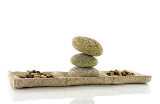 tower stack of stones in perfect balance isolated on white