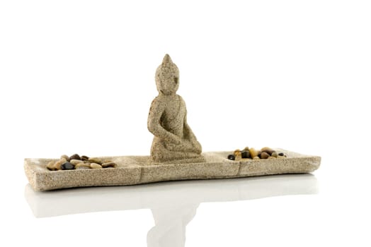 stones and budha statue isolated on white